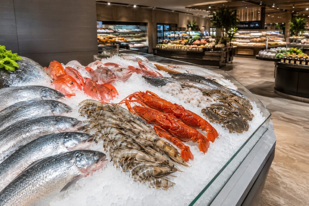 Professional seafood display ice bed at a luxury supermarket